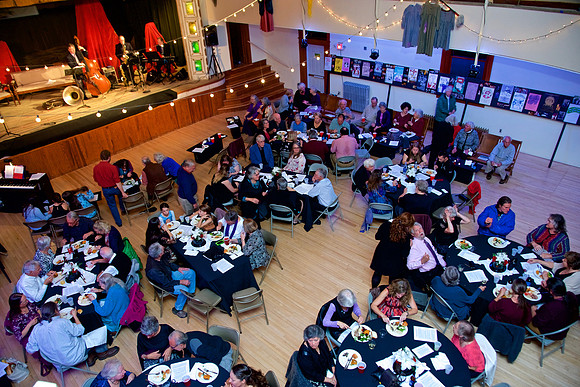 The Glendon Ingalls Band plays onstage while guests at the White River Valley Players 40th anniversary gala held last Saturday evening at Pierce Hall in Rochester enjoy dinner and conversation. (Heral